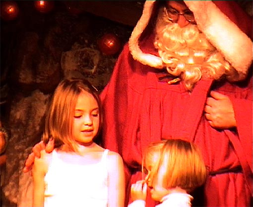Spectacles enfants deux petites filles avec le Père Noël